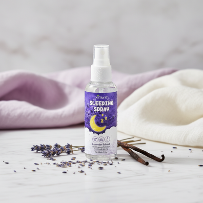 Flacon spray sommeil lavande 60ml sur marbre blanc avec brins de lavande
